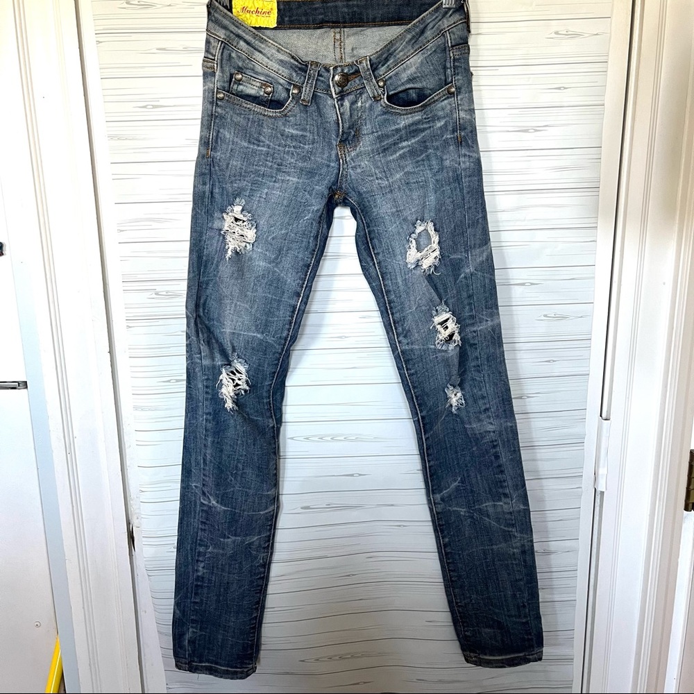 Distressed Machine Jeans